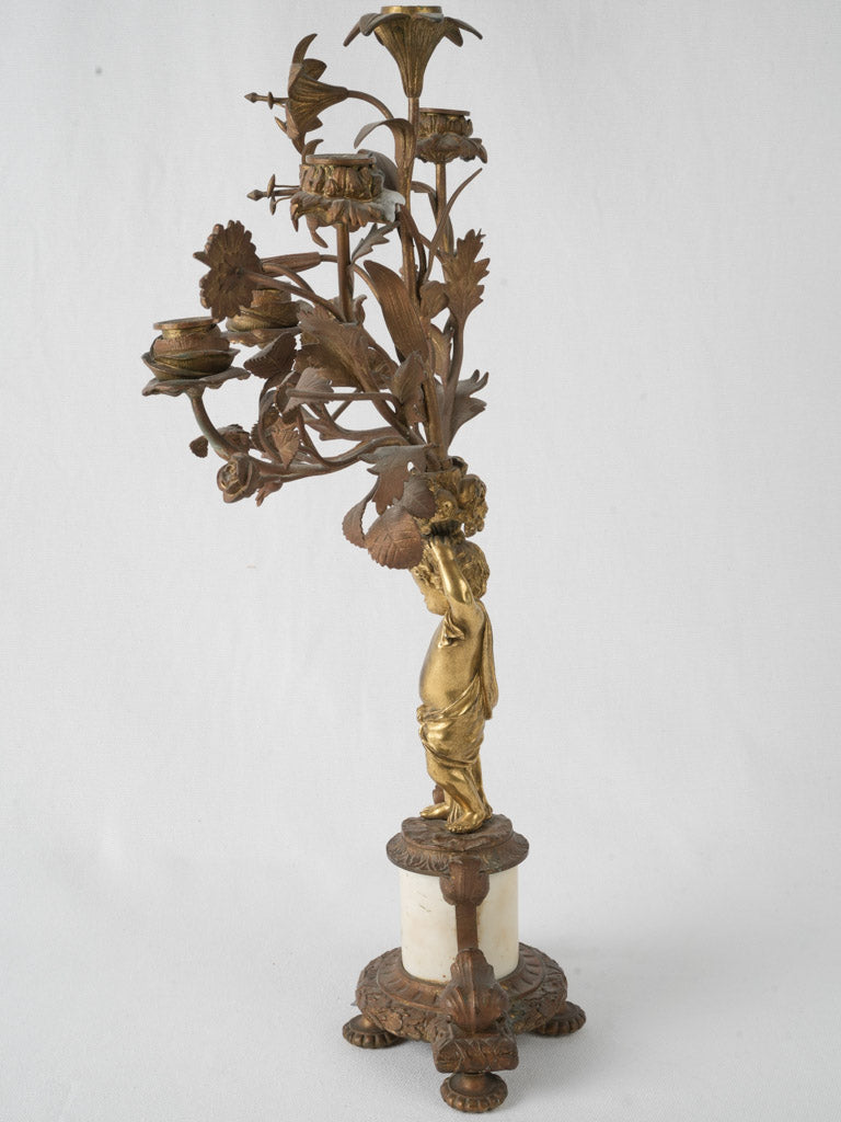 Charming French cherub and floral candelabra