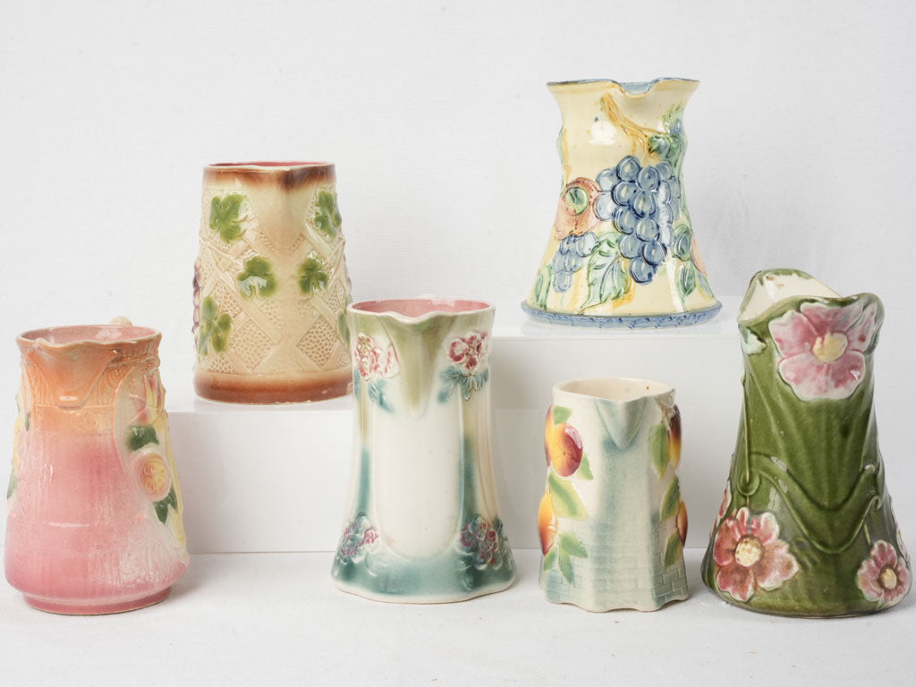 Set of Six Early 20th Century French Art Nouveau Majolica Pitchers