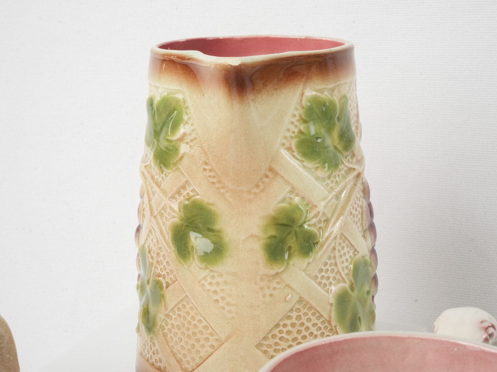 Set of Six Early 20th Century French Art Nouveau Majolica Pitchers