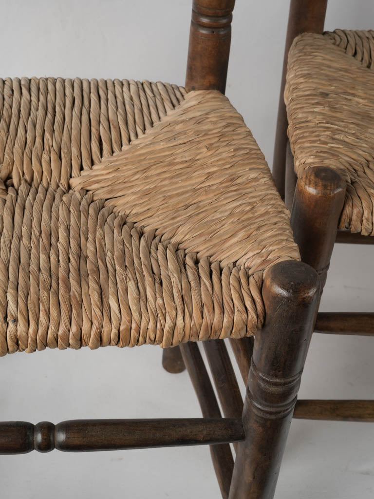 Classic aged ladderback rush seat dining chairs