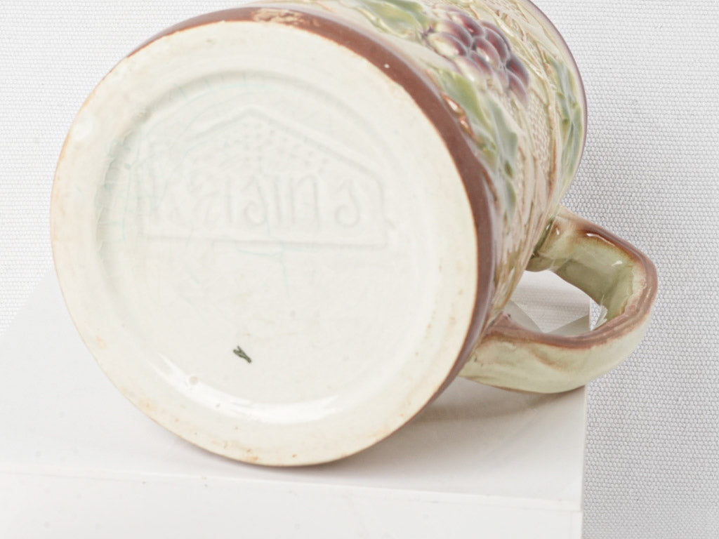 Set of Six Early 20th Century French Art Nouveau Majolica Pitchers