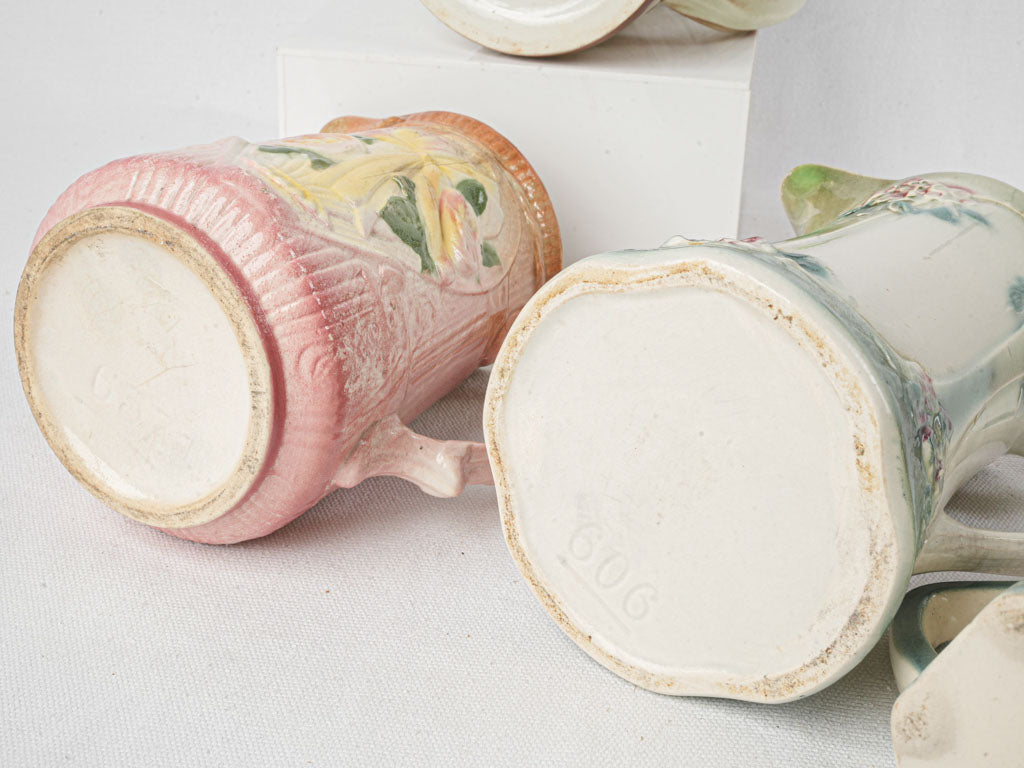 Set of Six Early 20th Century French Art Nouveau Majolica Pitchers