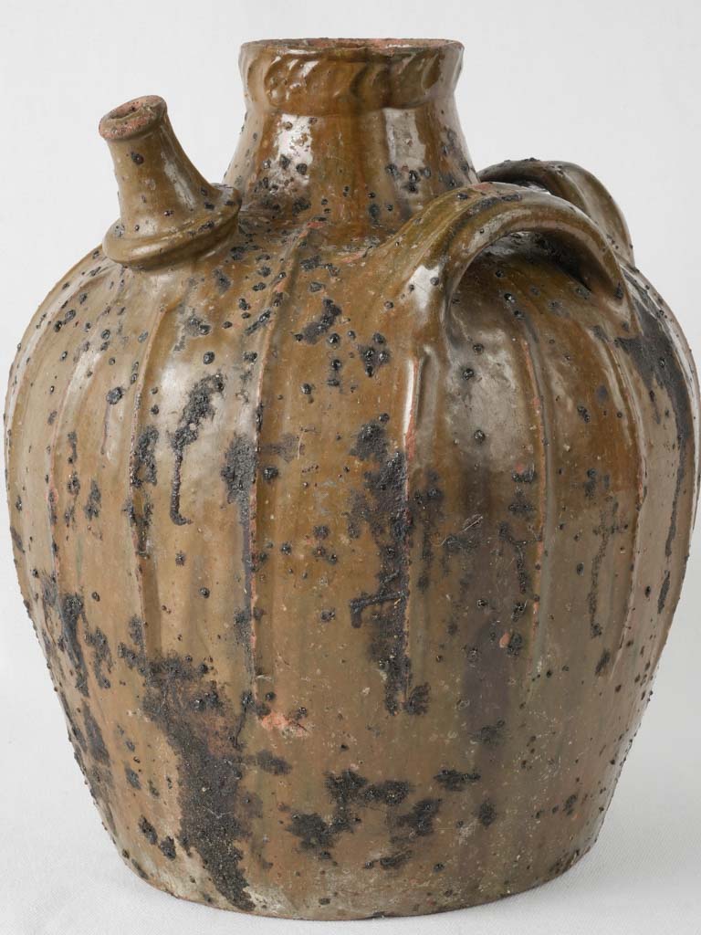 Lovely aged terracotta oil pot