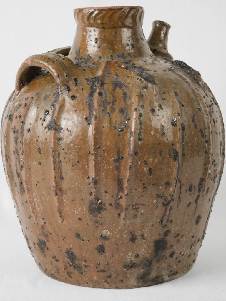 Authentic hand-pressed terracotta oil vessel 