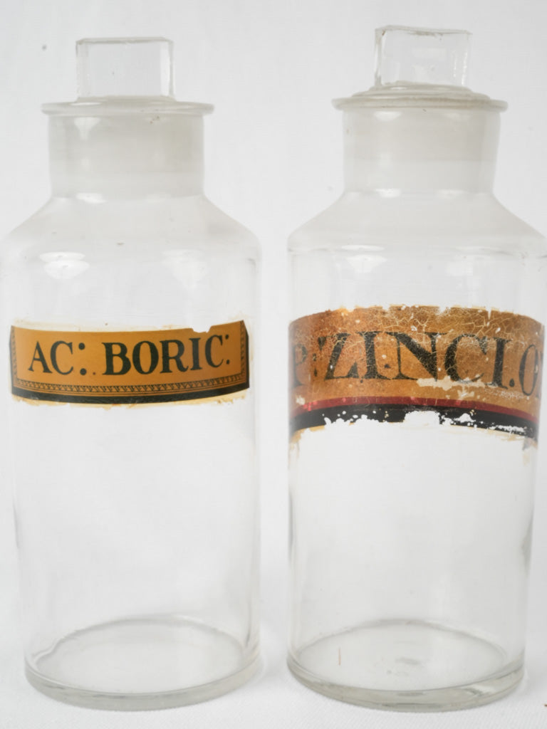 Elegant antique French glass apothecary bottles