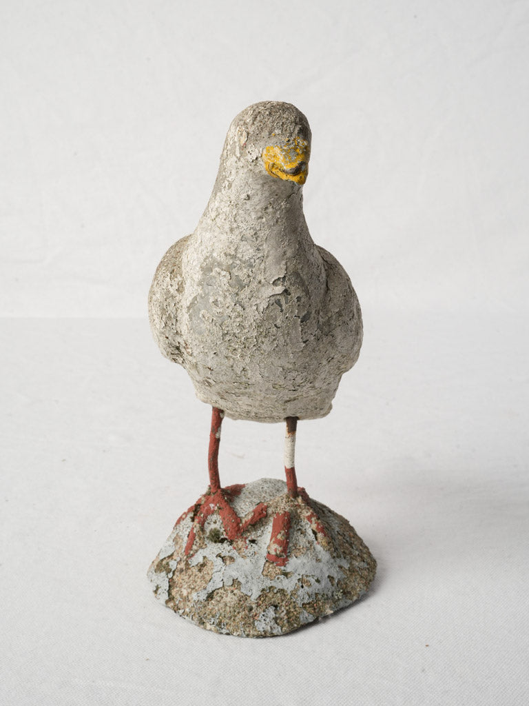 Rustic folk-art bird statue 