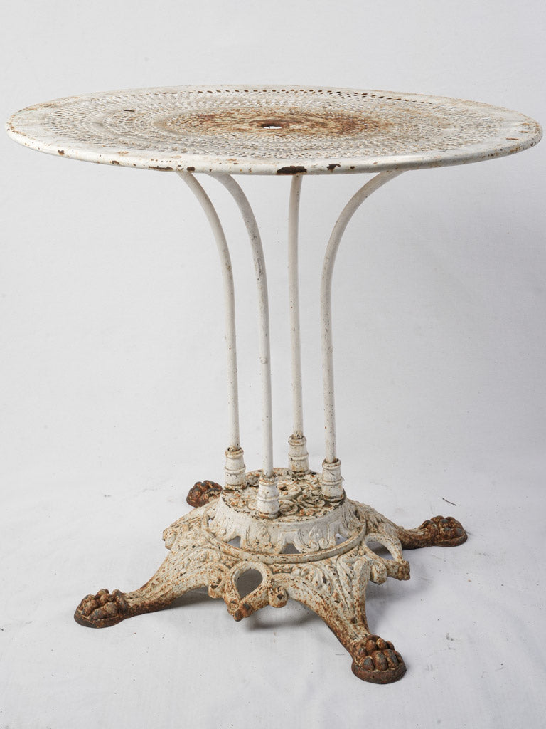 Ornate claw-foot garden table