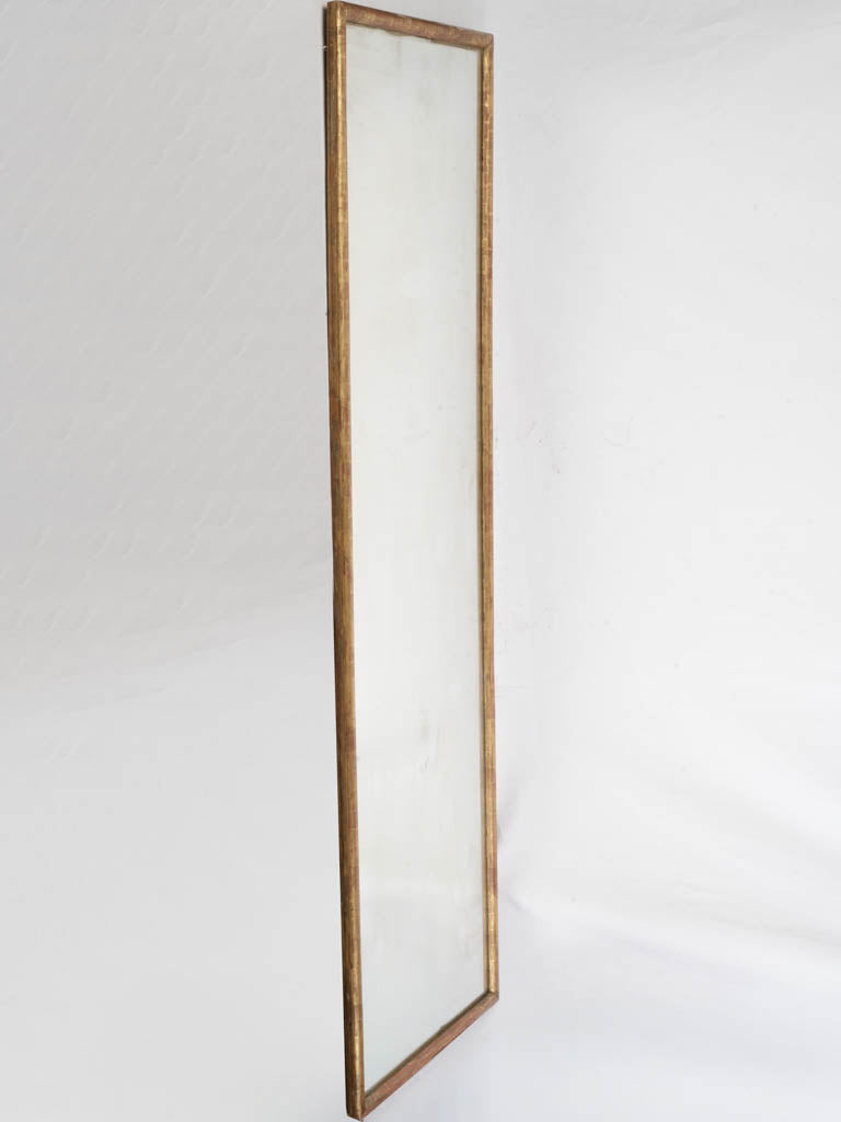 Slender gold-leaf wooden frame