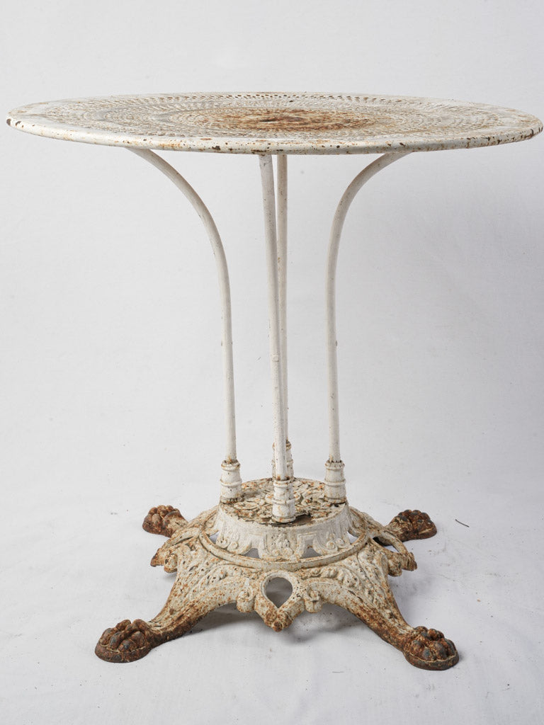Intricate lace-patterned metal table