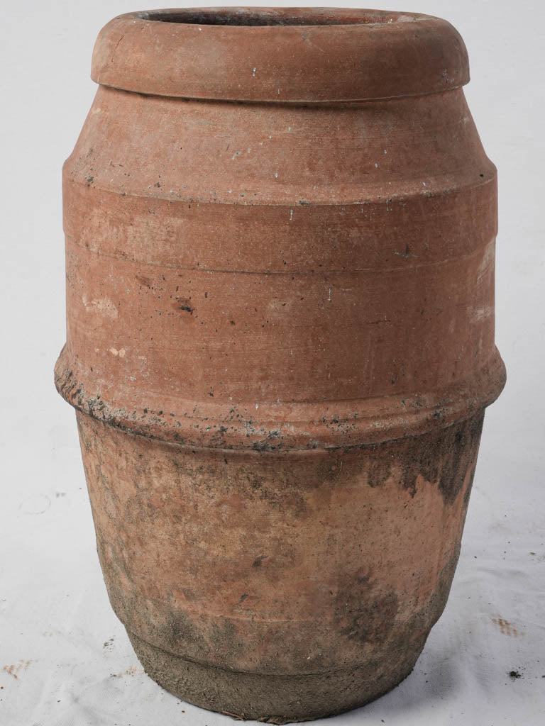 Aged hand-thrown pottery piece