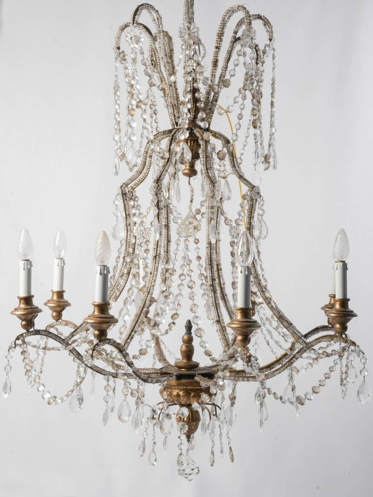 Elegant early-20th-century chandeliers