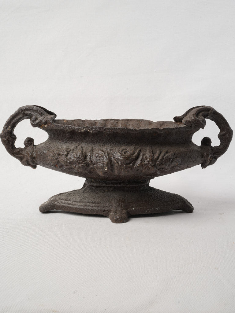 Rustic vintage iron urn  