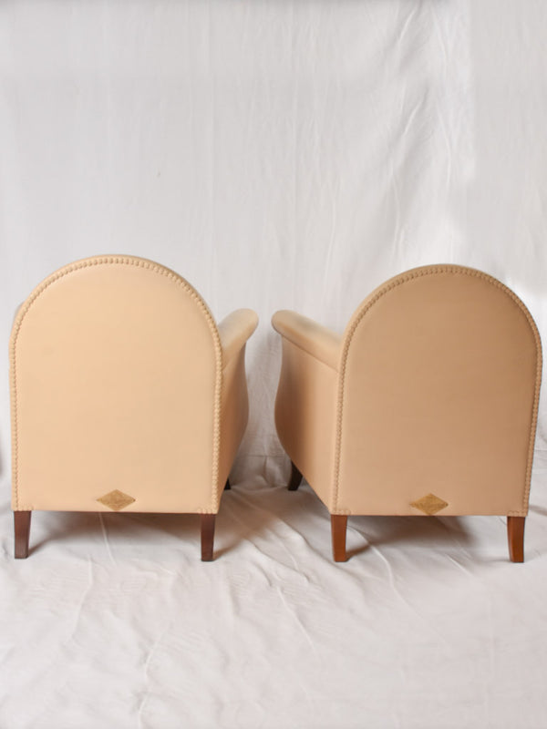 Pair of beige leather armchairs - Poltrona Frau Lyra