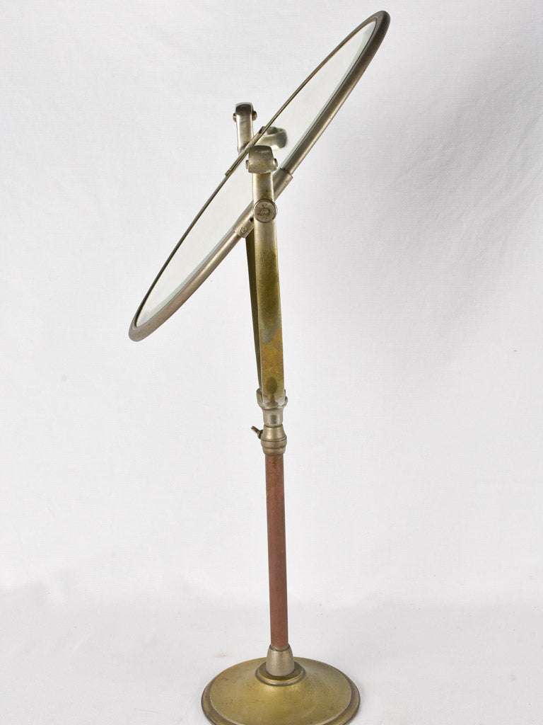 Adjustable early 20th-century brass mirror