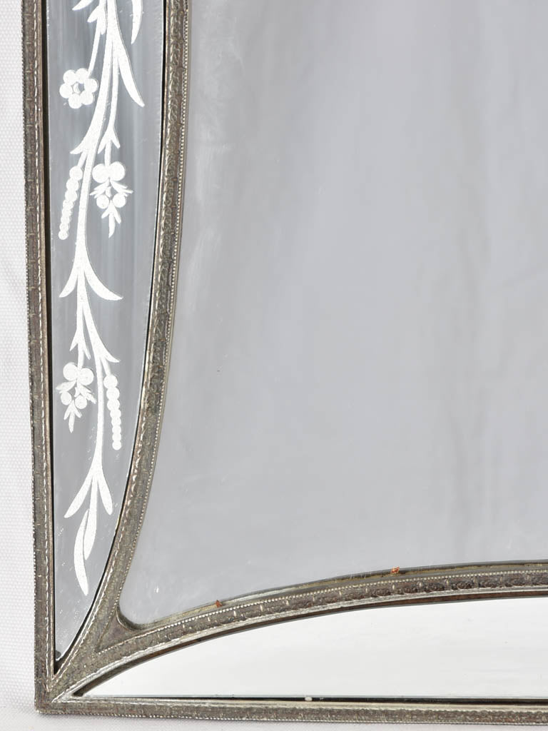 Traditional Venetian-style mirrored frame