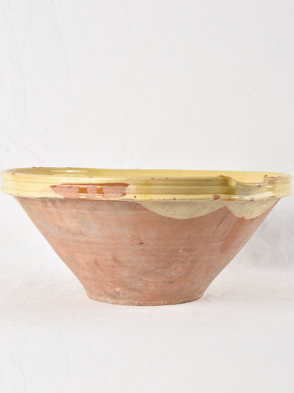 Large antique French bowl with yellow glaze 20"