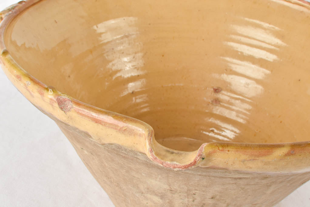 Large antique French bowl with ochre glaze 18"