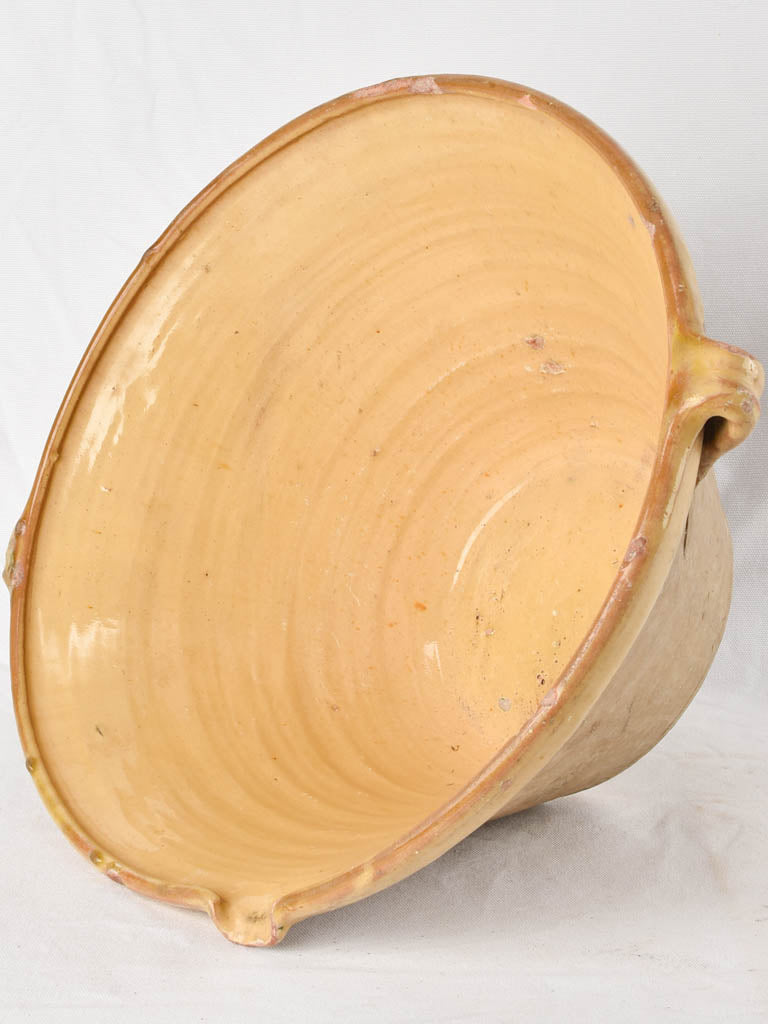 Large antique French bowl with ochre glaze 18"