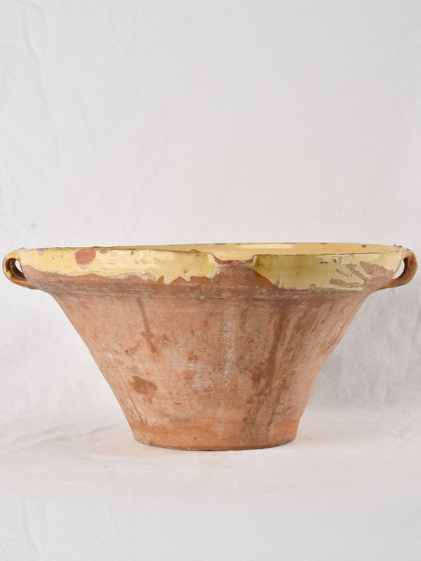 Large antique French bowl with ochre yellow glaze 19¼"