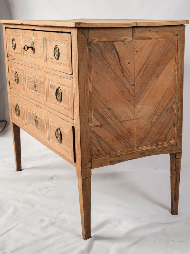 Warm-toned French antique commode  