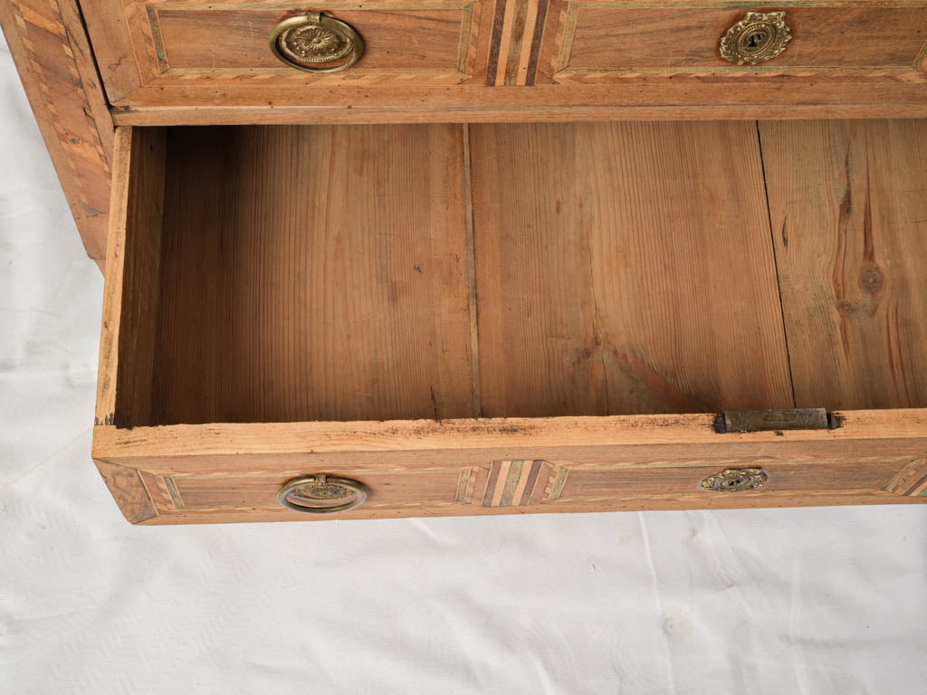 Decorative escutcheon detailed commode  