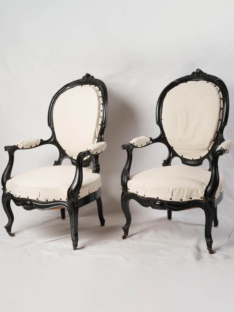 Elegant blackened wood armchairs