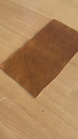 Artisan made leather foot rest for club chairs