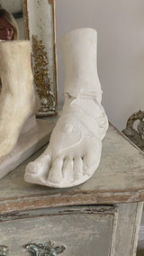 Sculpture of a foot in a sandal, vintage