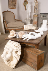 Historic plaster foot sculpture with wear
