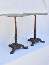 Pair of antique French garden tables with cast iron base