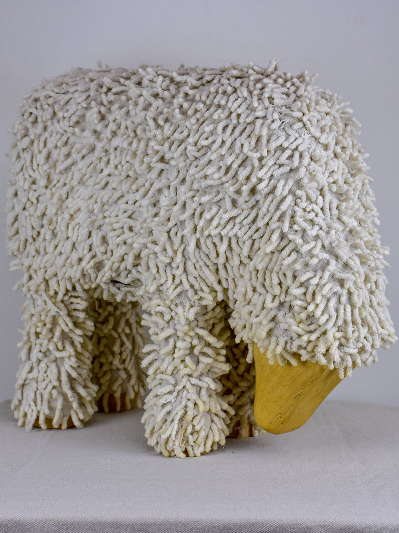 Vintage sculpture of a grazing sheep