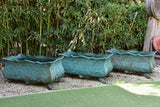 Two antique cast iron French garden planters with green finish