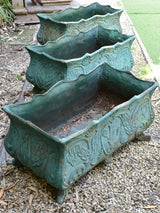 Two antique cast iron French garden planters with green finish