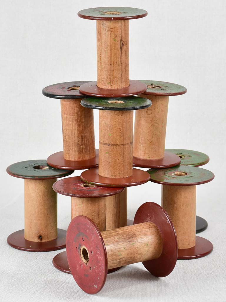 Collection of ten antique wooden bobbins