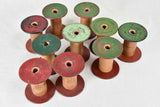 Collection of ten antique wooden bobbins