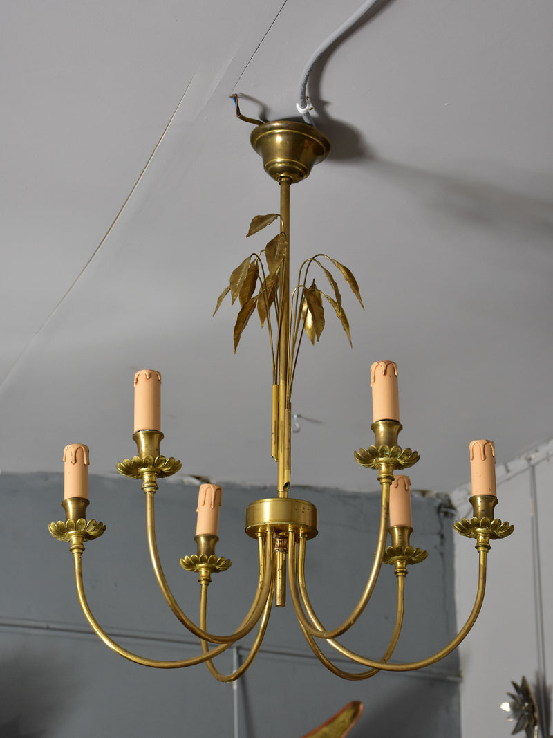 Pair of Maison Charles lustres with bay leaf detail
