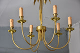 Pair of Maison Charles lustres with bay leaf detail