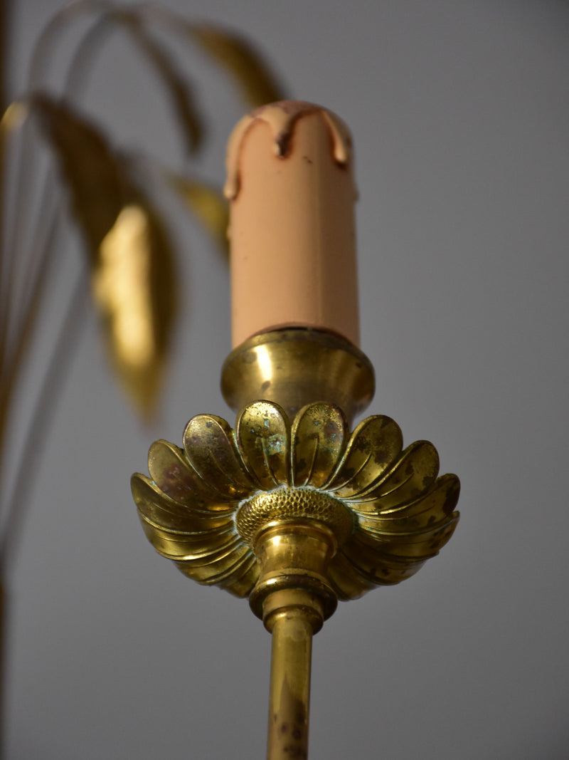 Pair of Maison Charles lustres with bay leaf detail