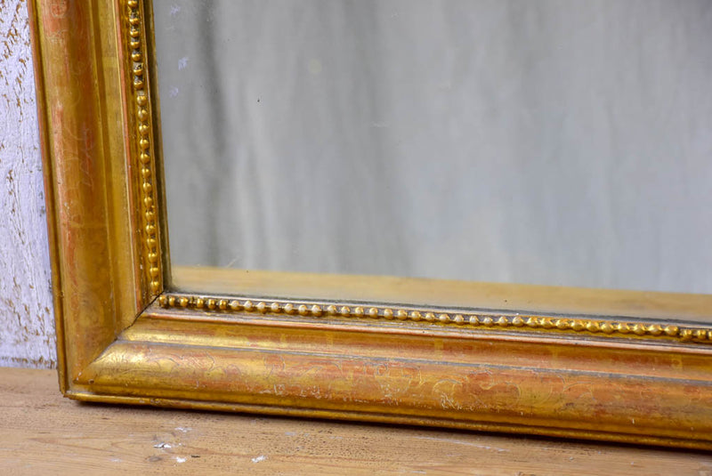 19th Century French Louis Philippe mirror with gilded frame and running pearl 28¼" x 37½"