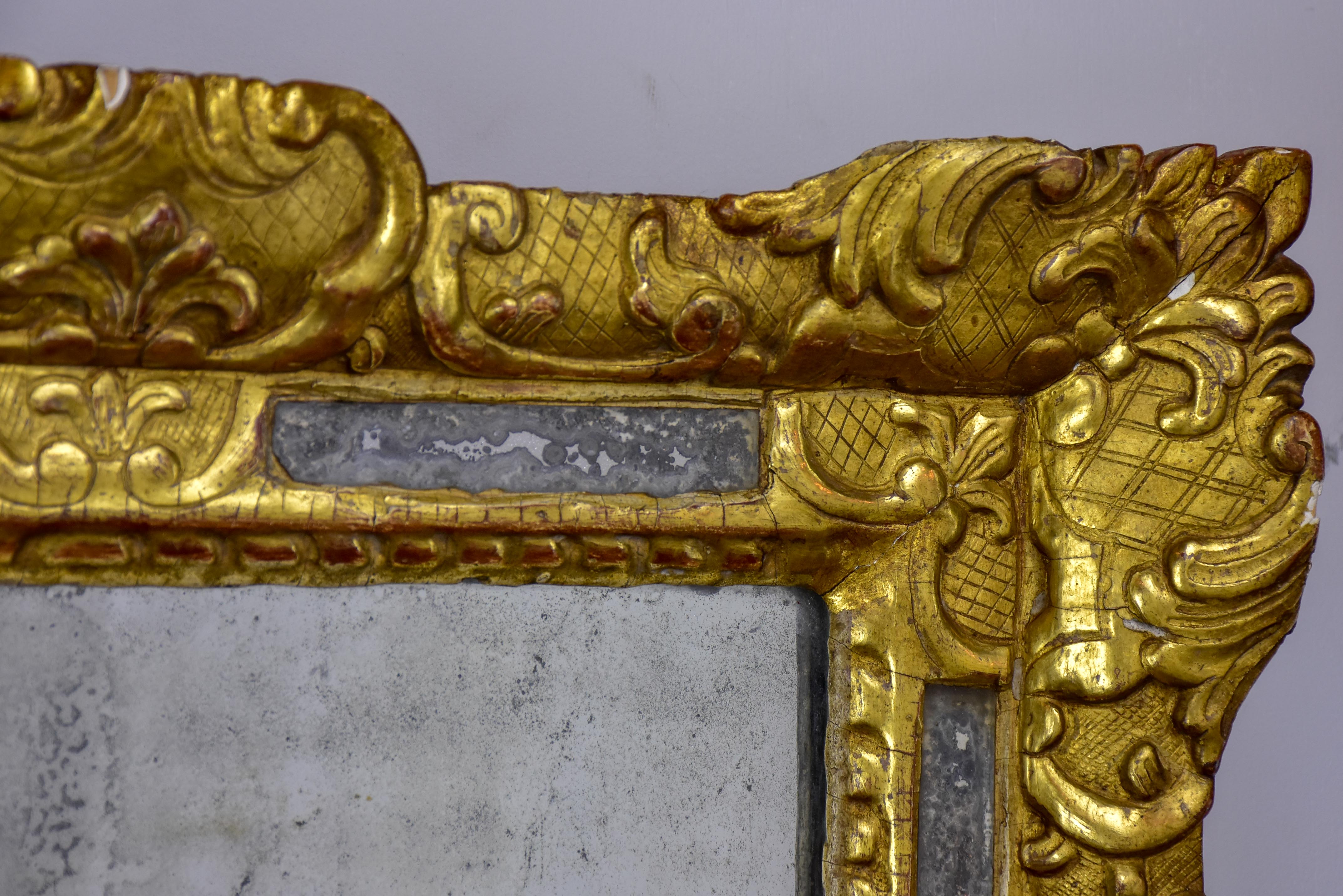 18th Century French mirror with gilded frame and aged glass 26” x 22 ½''