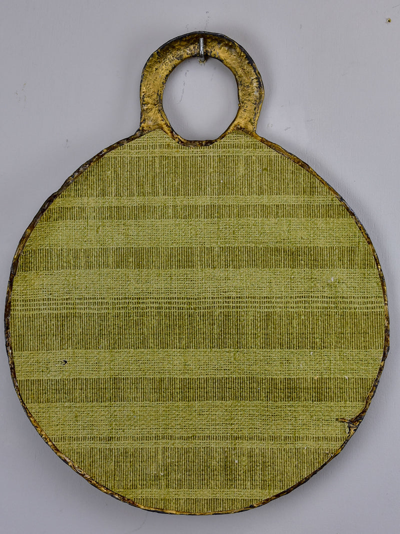 Small round mirror in the style of Line Vautrin