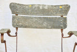 Four antique French iron and timber slatted garden armchairs