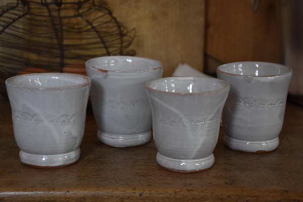 Set of four French artisan coffee cups