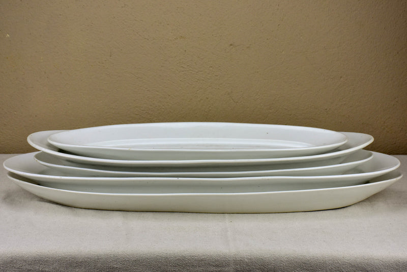 Collection of five antique Limoges fish platters