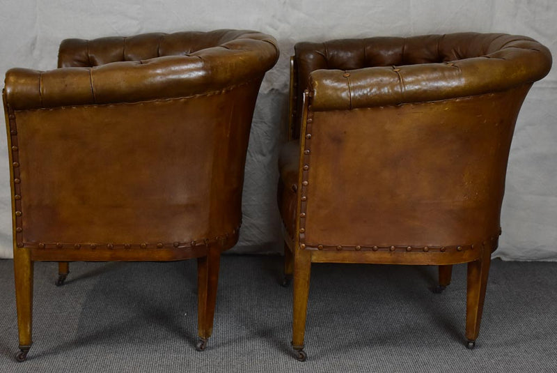 Pair of mid-century English leather armchairs