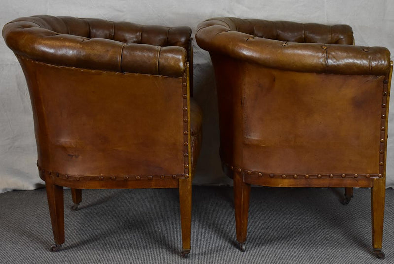 Pair of mid-century English leather armchairs