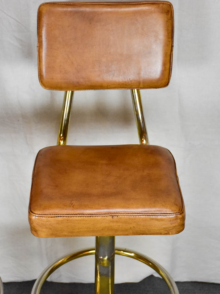 Pair of mid century French leather bar stools from a casino