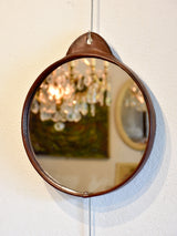 Vintage round mirror with leather frame