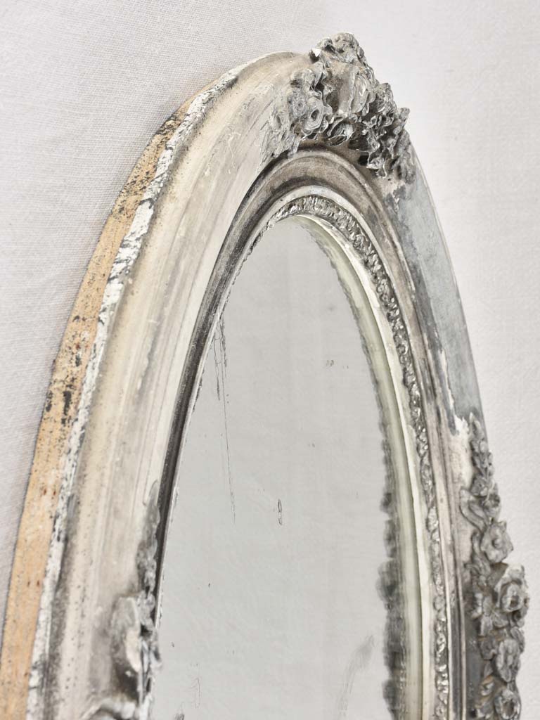 Gray framed vintage oval mirror