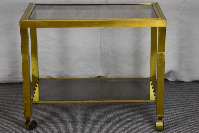 Mid century side table on wheels - glass and brass